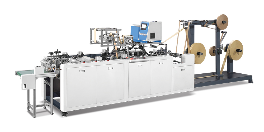 Máquina para fabricar asas de papel planas